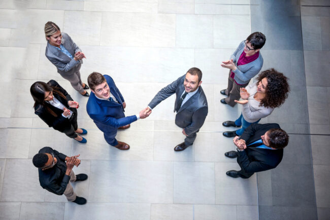 young multi ethnic business people group walking standing and top view